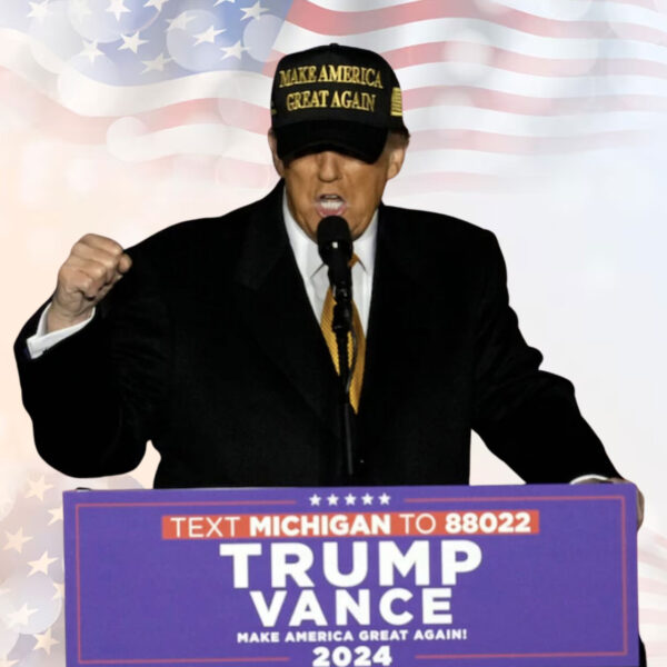 Donald Trump Wears Gold And Black MAGA Hat
